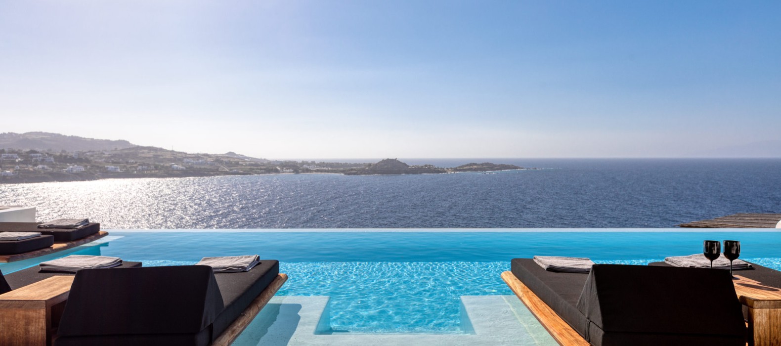 Exterior pool area with sea view of Villa White Diamond in Mykonos